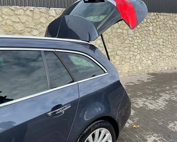 Синий Опель Инсигния, объемом двигателя 1.6 л и пробегом 250 тыс. км за 6999 $, фото 6 на Automoto.ua