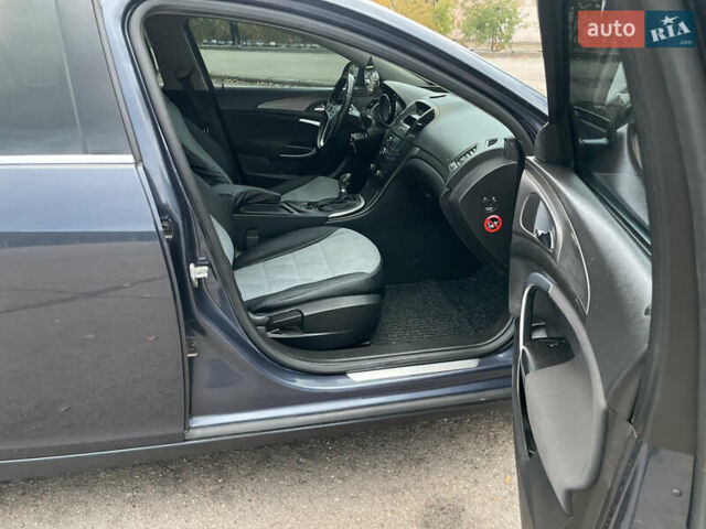 Синий Опель Инсигния, объемом двигателя 1.96 л и пробегом 289 тыс. км за 6594 $, фото 10 на Automoto.ua