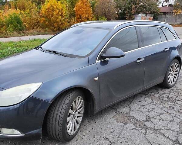Синій Опель Інсігнія, об'ємом двигуна 1.96 л та пробігом 281 тис. км за 5600 $, фото 22 на Automoto.ua