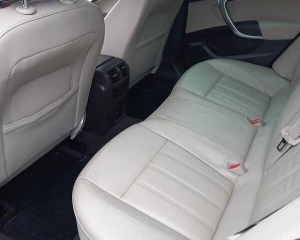 Синий Опель Инсигния, объемом двигателя 1.96 л и пробегом 278 тыс. км за 8200 $, фото 21 на Automoto.ua