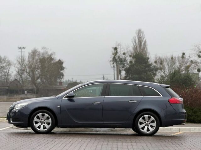 Синий Опель Инсигния, объемом двигателя 2 л и пробегом 306 тыс. км за 6800 $, фото 6 на Automoto.ua