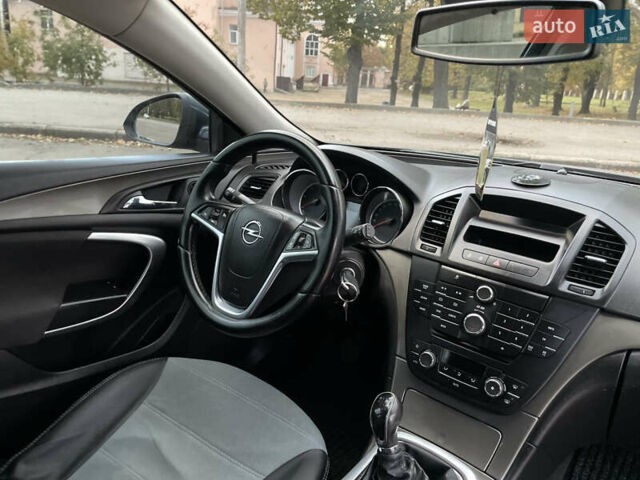 Синий Опель Инсигния, объемом двигателя 1.96 л и пробегом 289 тыс. км за 6594 $, фото 5 на Automoto.ua