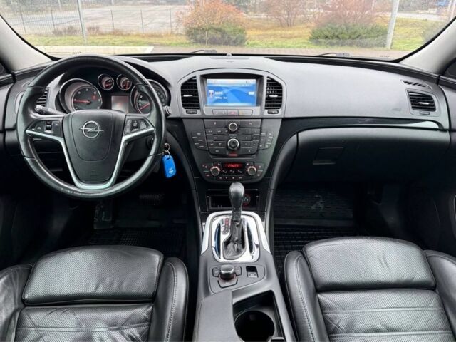 Синий Опель Инсигния, объемом двигателя 2 л и пробегом 306 тыс. км за 6800 $, фото 2 на Automoto.ua