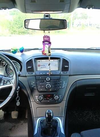 Синий Опель Инсигния, объемом двигателя 1.96 л и пробегом 256 тыс. км за 5620 $, фото 3 на Automoto.ua