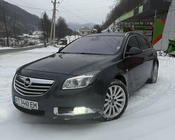 Синий Опель Инсигния, объемом двигателя 2 л и пробегом 256 тыс. км за 7800 $, фото 1 на Automoto.ua