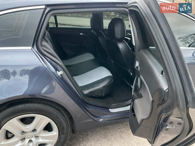 Синий Опель Инсигния, объемом двигателя 1.96 л и пробегом 289 тыс. км за 6594 $, фото 11 на Automoto.ua