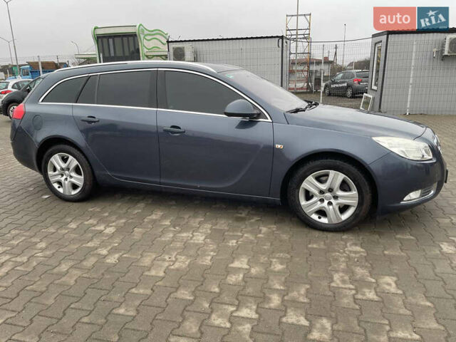 Синий Опель Инсигния, объемом двигателя 1.96 л и пробегом 246 тыс. км за 6650 $, фото 5 на Automoto.ua