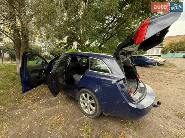 Синий Опель Инсигния, объемом двигателя 2 л и пробегом 241 тыс. км за 6900 $, фото 5 на Automoto.ua