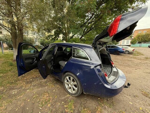 Синій Опель Інсігнія, об'ємом двигуна 2 л та пробігом 241 тис. км за 7100 $, фото 6 на Automoto.ua