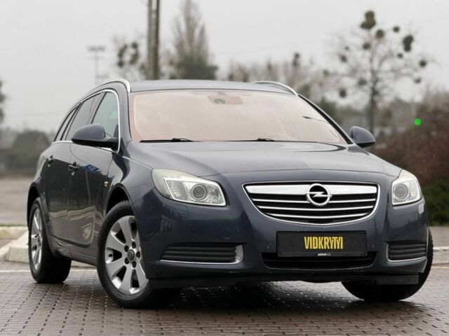 Синий Опель Инсигния, объемом двигателя 2 л и пробегом 306 тыс. км за 6800 $, фото 4 на Automoto.ua