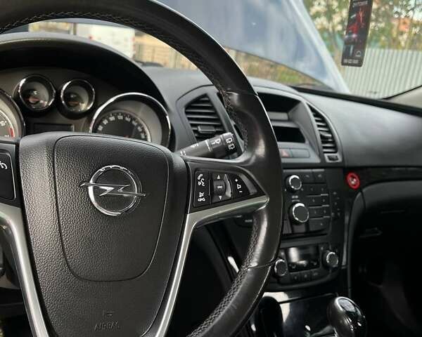 Синий Опель Инсигния, объемом двигателя 1.6 л и пробегом 250 тыс. км за 6999 $, фото 15 на Automoto.ua