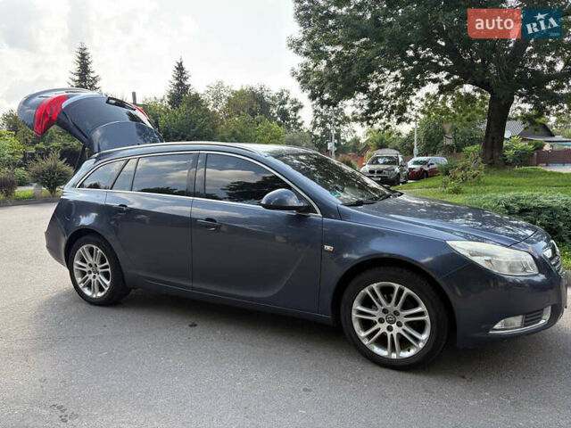 Синий Опель Инсигния, объемом двигателя 1.96 л и пробегом 312 тыс. км за 7500 $, фото 7 на Automoto.ua