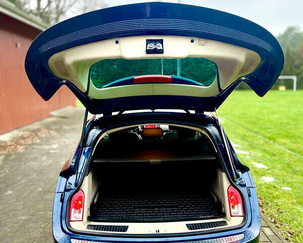 Синий Опель Инсигния, объемом двигателя 2 л и пробегом 260 тыс. км за 6800 $, фото 4 на Automoto.ua