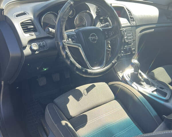 Синий Опель Инсигния, объемом двигателя 1.96 л и пробегом 281 тыс. км за 7000 $, фото 7 на Automoto.ua