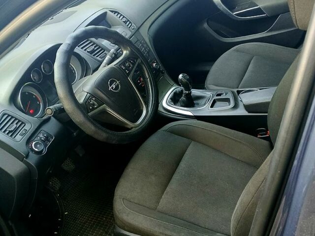 Синий Опель Инсигния, объемом двигателя 2 л и пробегом 230 тыс. км за 5500 $, фото 5 на Automoto.ua