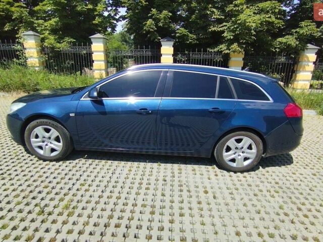 Синий Опель Инсигния, объемом двигателя 1.8 л и пробегом 180 тыс. км за 9000 $, фото 2 на Automoto.ua