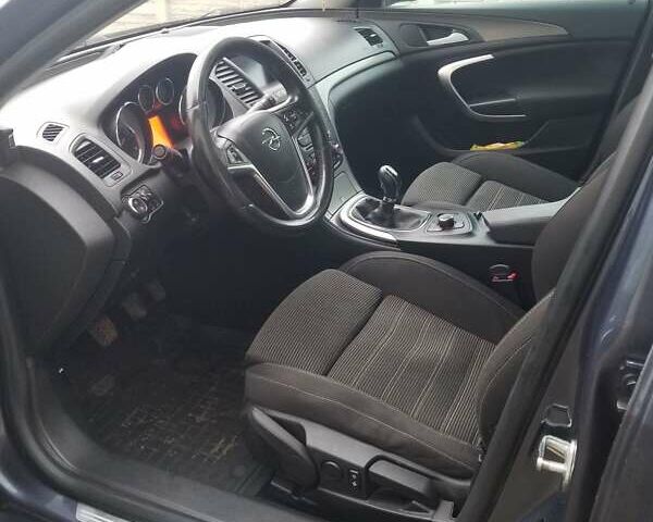 Синий Опель Инсигния, объемом двигателя 1.96 л и пробегом 376 тыс. км за 6500 $, фото 7 на Automoto.ua