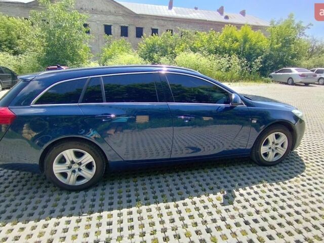 Синий Опель Инсигния, объемом двигателя 1.8 л и пробегом 180 тыс. км за 9000 $, фото 3 на Automoto.ua