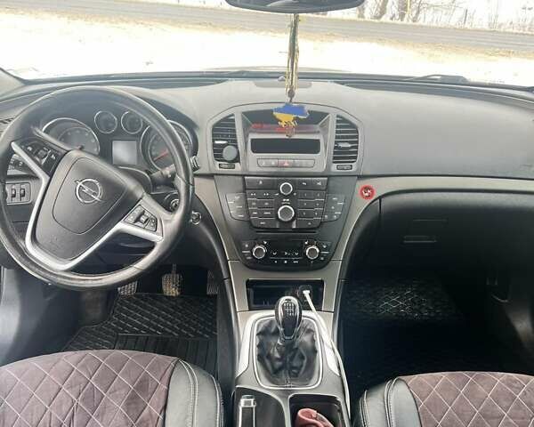Синий Опель Инсигния, объемом двигателя 1.6 л и пробегом 257 тыс. км за 6900 $, фото 5 на Automoto.ua