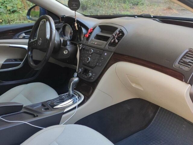 Синій Опель Інсігнія, об'ємом двигуна 2 л та пробігом 325 тис. км за 6200 $, фото 1 на Automoto.ua