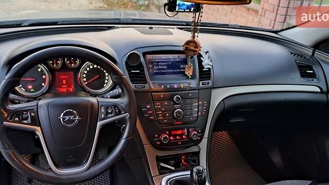 Синий Опель Инсигния, объемом двигателя 1.96 л и пробегом 311 тыс. км за 6700 $, фото 9 на Automoto.ua