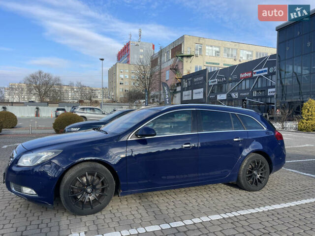 Синий Опель Инсигния, объемом двигателя 1.96 л и пробегом 265 тыс. км за 6600 $, фото 4 на Automoto.ua