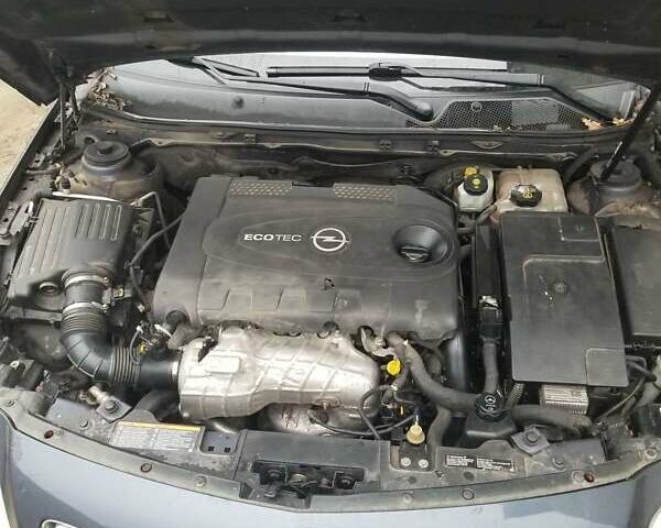 Синий Опель Инсигния, объемом двигателя 1.96 л и пробегом 376 тыс. км за 6500 $, фото 5 на Automoto.ua