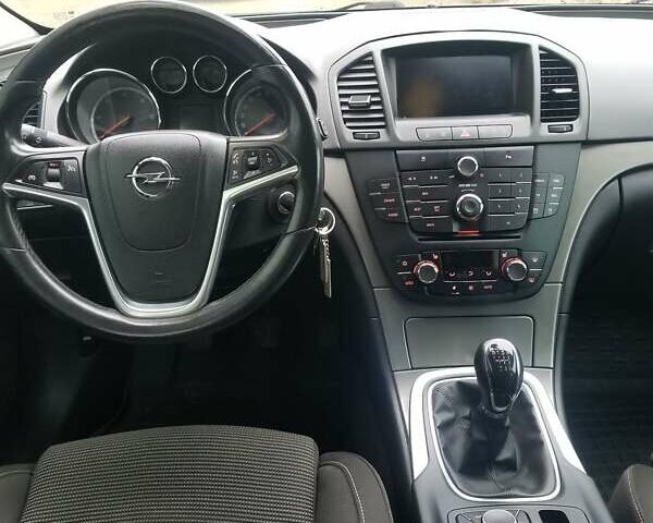 Синий Опель Инсигния, объемом двигателя 1.96 л и пробегом 376 тыс. км за 6500 $, фото 6 на Automoto.ua