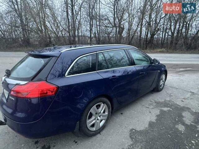 Синий Опель Инсигния, объемом двигателя 1.96 л и пробегом 298 тыс. км за 6500 $, фото 4 на Automoto.ua