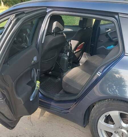 Синій Опель Інсігнія, об'ємом двигуна 1.96 л та пробігом 288 тис. км за 7200 $, фото 5 на Automoto.ua