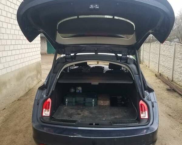 Синий Опель Инсигния, объемом двигателя 1.96 л и пробегом 376 тыс. км за 6500 $, фото 2 на Automoto.ua