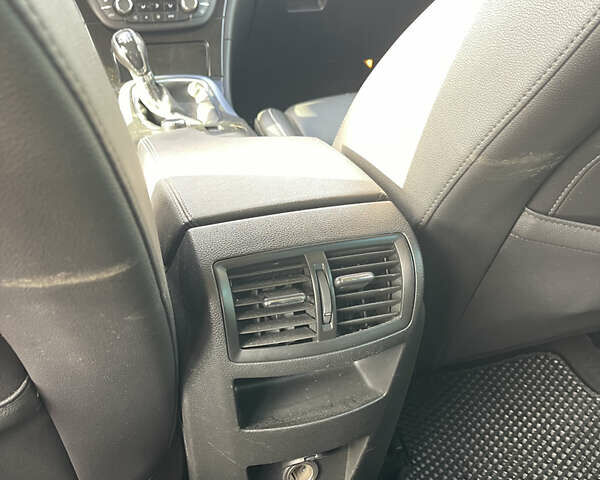 Синій Опель Інсігнія, об'ємом двигуна 1.96 л та пробігом 265 тис. км за 6600 $, фото 15 на Automoto.ua