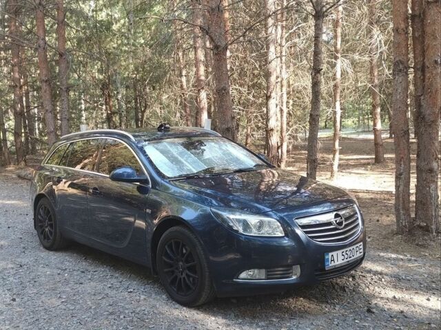 Синий Опель Инсигния, объемом двигателя 2 л и пробегом 283 тыс. км за 7250 $, фото 1 на Automoto.ua