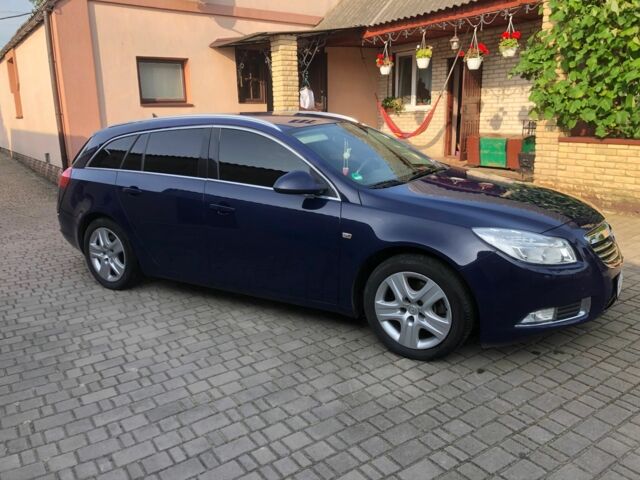 Синий Опель Инсигния, объемом двигателя 2 л и пробегом 238 тыс. км за 7200 $, фото 2 на Automoto.ua
