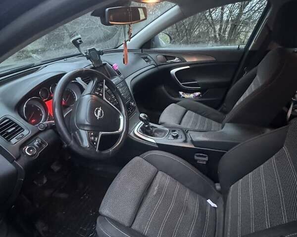 Синий Опель Инсигния, объемом двигателя 1.96 л и пробегом 298 тыс. км за 7200 $, фото 3 на Automoto.ua