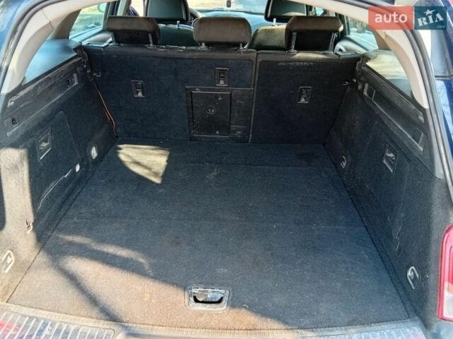 Синий Опель Инсигния, объемом двигателя 2 л и пробегом 329 тыс. км за 6500 $, фото 12 на Automoto.ua