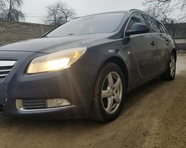 Синий Опель Инсигния, объемом двигателя 1.96 л и пробегом 376 тыс. км за 6500 $, фото 1 на Automoto.ua