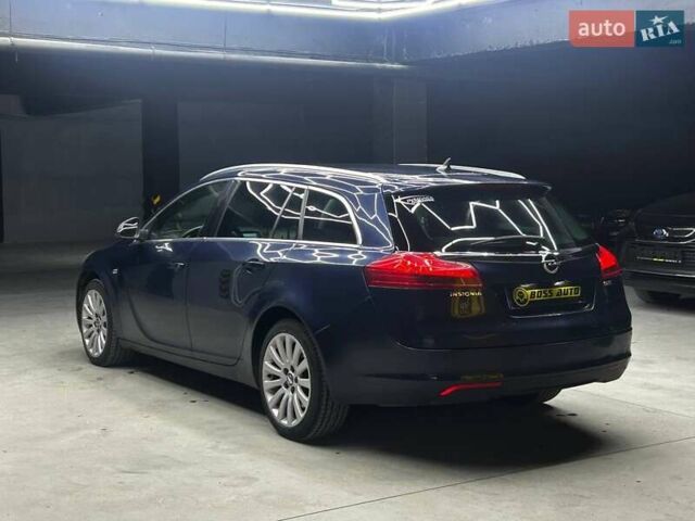 Синий Опель Инсигния, объемом двигателя 2 л и пробегом 211 тыс. км за 8800 $, фото 3 на Automoto.ua