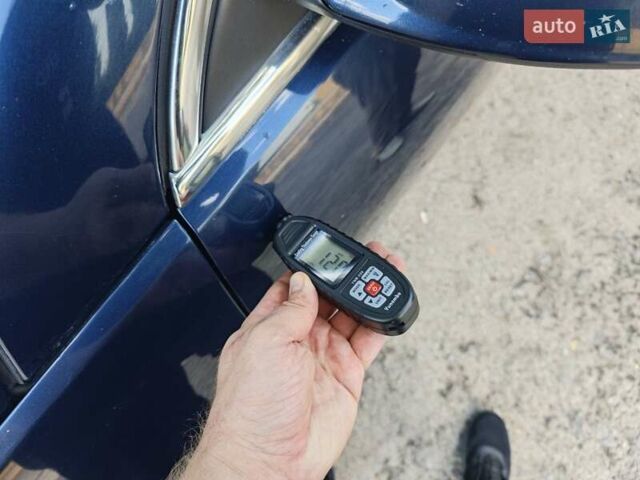 Синий Опель Инсигния, объемом двигателя 1.96 л и пробегом 224 тыс. км за 11500 $, фото 171 на Automoto.ua