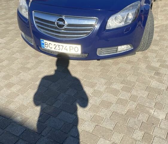 Синий Опель Инсигния, объемом двигателя 2 л и пробегом 345 тыс. км за 7500 $, фото 1 на Automoto.ua