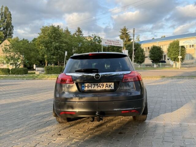 Синий Опель Инсигния, объемом двигателя 2 л и пробегом 340 тыс. км за 8000 $, фото 3 на Automoto.ua