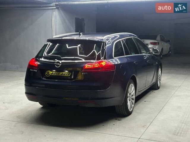 Синий Опель Инсигния, объемом двигателя 2 л и пробегом 211 тыс. км за 8800 $, фото 5 на Automoto.ua