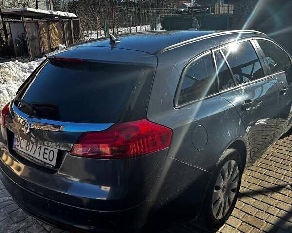 Синій Опель Інсігнія, об'ємом двигуна 1.96 л та пробігом 300 тис. км за 7200 $, фото 2 на Automoto.ua