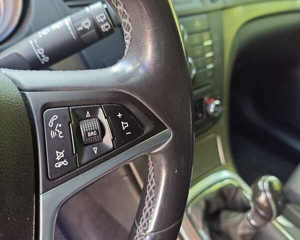 Синий Опель Инсигния, объемом двигателя 1.96 л и пробегом 224 тыс. км за 11500 $, фото 71 на Automoto.ua