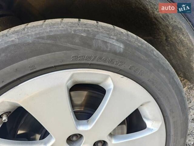 Синий Опель Инсигния, объемом двигателя 1.96 л и пробегом 224 тыс. км за 11500 $, фото 105 на Automoto.ua