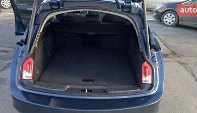 Синий Опель Инсигния, объемом двигателя 1.8 л и пробегом 208 тыс. км за 7300 $, фото 5 на Automoto.ua