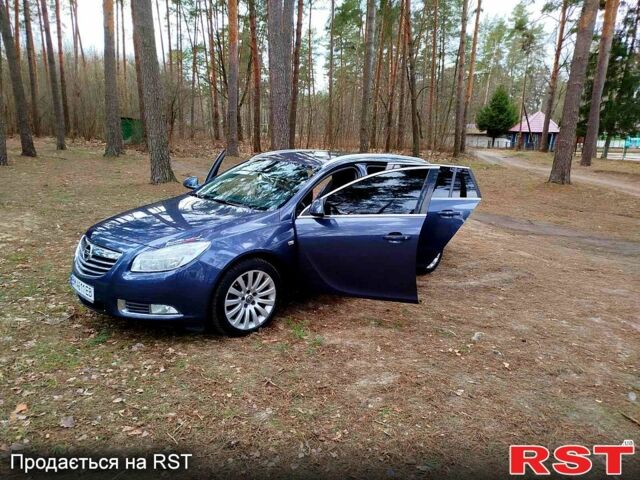 Синий Опель Инсигния, объемом двигателя 2 л и пробегом 303 тыс. км за 7700 $, фото 2 на Automoto.ua