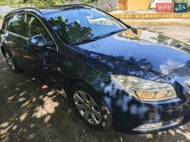 Синий Опель Инсигния, объемом двигателя 1.96 л и пробегом 224 тыс. км за 11500 $, фото 4 на Automoto.ua