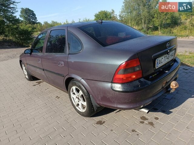 Синий Опель Инсигния, объемом двигателя 2 л и пробегом 257 тыс. км за 7613 $, фото 2 на Automoto.ua