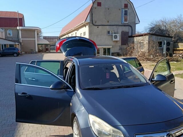 Синий Опель Инсигния, объемом двигателя 2 л и пробегом 230 тыс. км за 7300 $, фото 3 на Automoto.ua